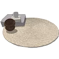 Light Beige Woven Round Rug With Open Book White Mug And Brown Basket