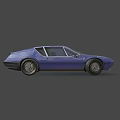Blue Vintage Sports Car With Streamlined Body And Unique Front Headlights
