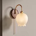 Elegant Golden Metal Wall Light with Wooden Base and White Petal Lampshade on Gray Wall