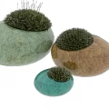 Grass Like Plants In Green Round Textured Vase For Modern Interior Decoration With Natural Light