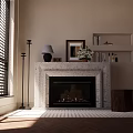 Stone Fireplace Interior With Burning Fire Framed Artwork Table Lamp And Bookshelf