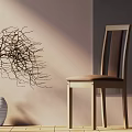 Single Chair With Light Colored Wall Wooden Floor And White Vase With Dried Branches