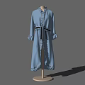 Mannequin Wearing Blue Long Robe With Black Belt And Ruffled Cuffs