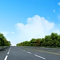 Wide Road Facilities Featuring Trees Yellow Dividing Lines White Lane Lines Blue Sky White Clouds