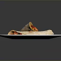 Burritos Stuffed With Vegetables And Meat On White Plate Garnished With Red Chili Flakes Parsley