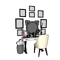 Elegant Perfumes and Cosmetics Display on Dressing Table with Chair and Picture Frames