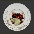 Fresh Fruit Platter with Apple Slices Strawberries and Blueberries on White Plate for Happy Birthday
