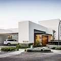 Modern Detached Villa With White Exterior Geometric Architecture And Landscaped Driveway
