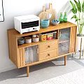 Modern Wooden Sideboard With Glass Doors Drawers Microwave Dishes And Potted Plant