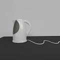 Essential White Electric Kettle Kitchen Appliance With Power Cord On Black Tabletop