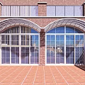 Arched Glass Entrance Gate Of Red Brick Building With Tiled Courtyard And Wooden Fence