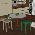 Modern Simple Kitchen Corner With Round Table And Colorful Green Red Beige Stools 3d model