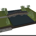 Traditional Chinese Arch Bridge With Black Tile Roof Over Pond Green Grass And Trees