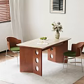 Bright Interior Wooden Dining Table With Circular Cutouts Vase Flowers And Green Chairs