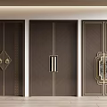 Elegant Dark Brown Double Doors With Golden Accents And Intricate Handle Designs
