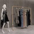 Gold Clothes Rack With Hanging Dresses And Dress Mannequin In Grey Room