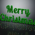 Merry Christmas Green Decorative Text With Red Ornaments And Reflection
