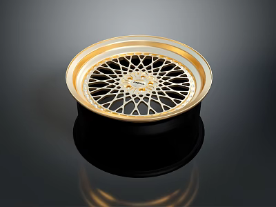 Shiny Black And Gold Car Wheel Rim With Mesh Spoke Design 3d model