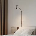Modern Metal Wall Lamp For Bedroom With White Wall Brown Curtains And Marble Bedside Table