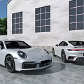 Sleek White Sports Cars Parked In Front Of Modern Building With Large Windows