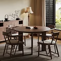 Rustic Dining Room With Round Wooden Table Chairs Sideboard And Natural Light
