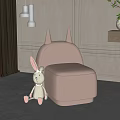 Pink Single Sofa With Small Pointed Horns White Rabbit Plush Toy Light Walls Brown Curtains