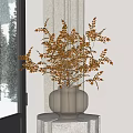 Transparent Glass Vase With Golden And Brown Foliage On White Pedestal