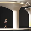 Modern Architectural Column Designs With Curved Tops Striped Patterns And Illuminated Bases