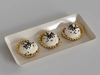 Cupcakes with White Cream Topped Black Sprinkles on White Rectangular Plate in Light Brown Cups 3d model