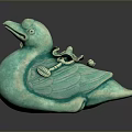 Teal Duck Sculpture With Reclining Posture And Decorative Ornaments On Back