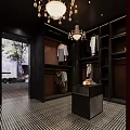 Elegant Clothing Store Interior With Red Walls Chandeliers Dark Shelves Mannequin Hanging Clothes