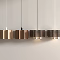 Modern Wooden Pendant Lights With Striped Design Hanging In Row On Light Wall