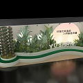 Floral Art Installation With Ship Style Flower Wall And Large Green Plant Decorations