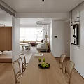 Modern Living and Dining Room Interior With Beige Sofa Glass Coffee Table And Wooden Flooring