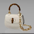 Stylish White Handbag With Bamboo Handle And Gold Chain Design