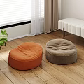 Two Round Orange And Gray Bean Bag Chairs On Wooden Floor In Living Room