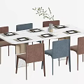 Modern Rectangular Dining Table Set With White Top Brown Blue Chairs And Plant Decoration 3d model