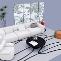 White Sofa and Black Round Coffee Table with Geometric Rug Plant Screen in Living Room