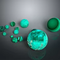 Green Decorative Spheres for Home Decor with Various Sizes and Textures on Gray Background