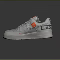 Stylish White Athletic Sneakers With Orange Accents And Just Do It Lettering Design Details