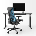Modern Black Office Desk With Monitor Keyboard Mouse And Ergonomic Blue Mesh Chair