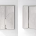 Modern Light Colored Wall Decor with Geometric Textured Design Hanging on White Wall