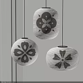 Japanese Lantern Pendant Lights Featuring Floral Patterns In Beige And Brown Tones