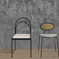 Modern Dining Chairs With Unique Backrest Designs And Neutral Seats 3d model