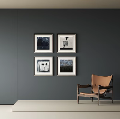 Abstract Paintings On Dark Gray Wall With Four Framed Artworks And Brown Chair 3d model