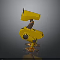 Small Yellow Mechanical Arm With Metal Structure And Orange Worn Joints