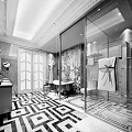 Luxurious Neoclassical Bathroom With Patterned Marble Floors Freestanding Bathtub And Gold Trim Glass Shower Partition