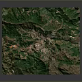 3D Terrain Landscape With Green Mountain Ranges And Small Town Settlement