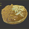 Intricate Donut Sculpture Carving With Orange White Crumbs And Brown Glaze Design