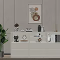 Stylish White Cabinet with Black Bear Figurine Clock Books and Green Plant Near Wall Painting